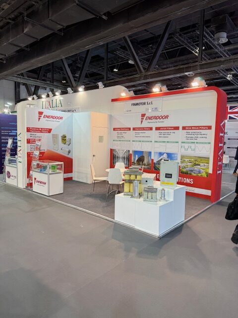 Enerdoor exhibition booth displaying harmonic filters and industrial EMI-RFI filters in Dubai